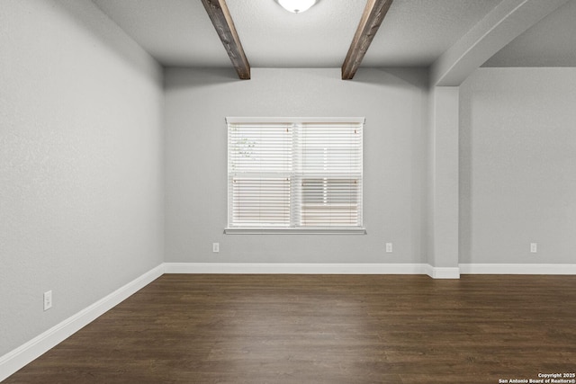 10307 Royal, San Antonio, TX 78245 - unfurnished room with beam ceiling, dark wood finished floors, and baseboards
