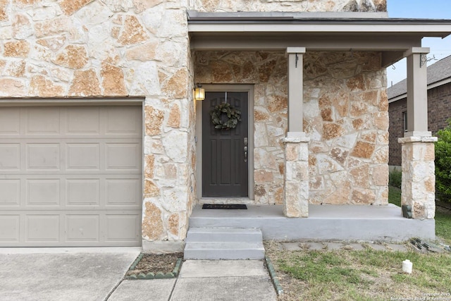 10307 Royal, San Antonio, TX 78245 - property entrance featuring stone siding and a garage