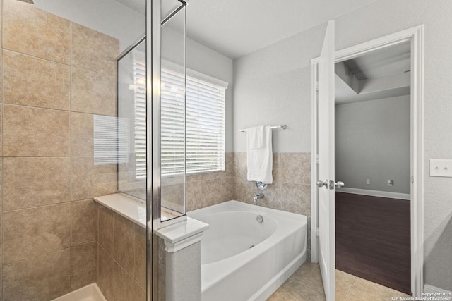 10307 Royal, San Antonio, TX 78245 - full bath featuring a garden tub, a shower stall, and tile patterned floors