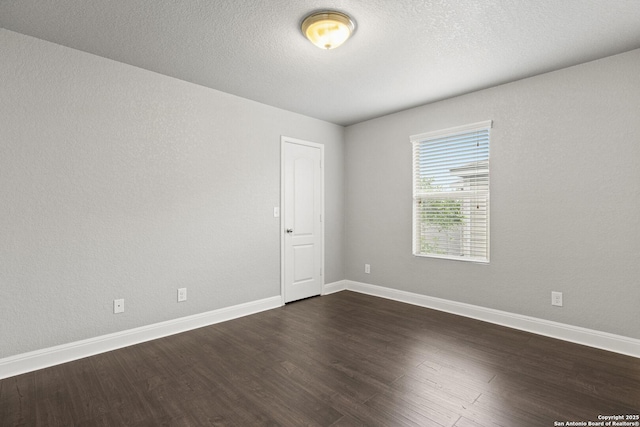 10307 Royal, San Antonio, TX 78245 - unfurnished room featuring dark wood-style flooring and baseboards