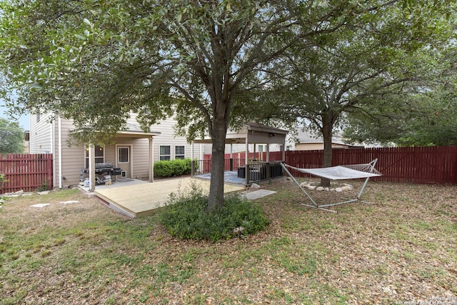 10307 Royal, San Antonio, TX 78245 - fenced backyard featuring a deck