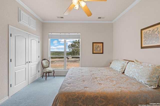 2001 Crown Rdg, Kerrville, TX 78028 - carpeted bedroom featuring ornamental molding, a ceiling fan, a closet, and baseboards