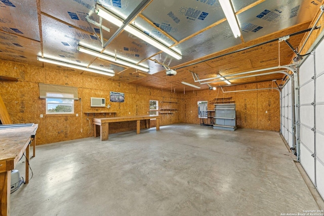2001 Crown Rdg, Kerrville, TX 78028 - garage featuring a workshop area and a garage door opener