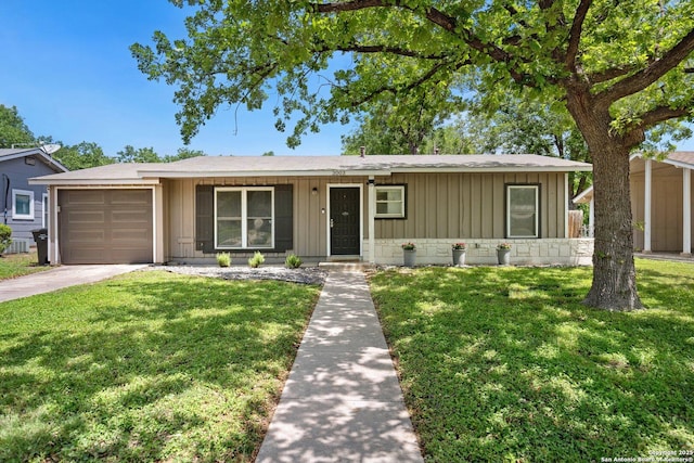 3003 Shady Spgs, San Antonio, TX 78230 - view of front facade featuring an attached garage, a front lawn, driveway, and board and batten siding