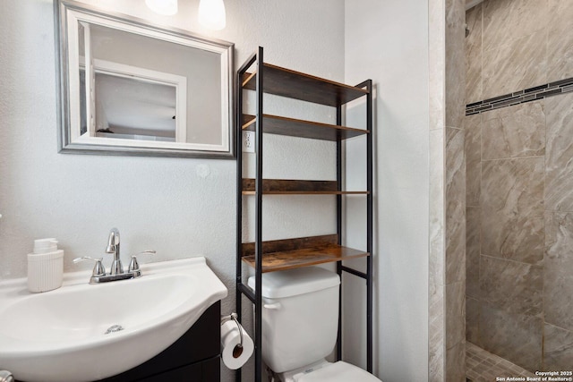 3003 Shady Spgs, San Antonio, TX 78230 - full bath with a sink, tiled shower, toilet, and a textured wall