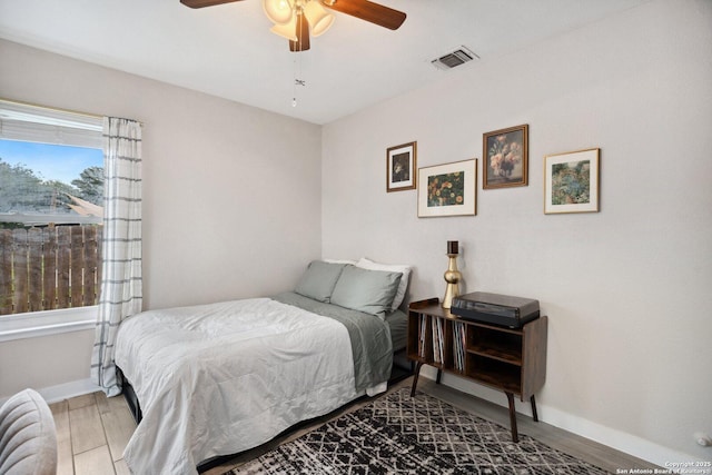 3003 Shady Spgs, San Antonio, TX 78230 - bedroom featuring wood finished floors, baseboards, and ceiling fan