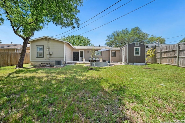 3003 Shady Spgs, San Antonio, TX 78230 - rear view of house with an outdoor structure, a patio area, a shed, and central AC