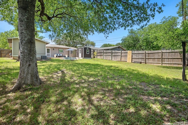 3003 Shady Spgs, San Antonio, TX 78230 - view of yard featuring an outbuilding, central AC, a patio area, and a storage shed