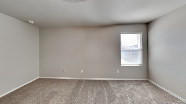 13778 Bradford Park, San Antonio, TX 78253 - unfurnished room with carpet flooring, baseboards, and a smoke detector