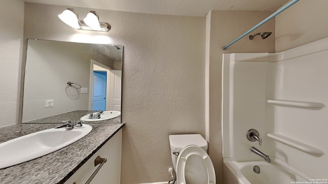 13778 Bradford Park, San Antonio, TX 78253 - bathroom with bathtub / shower combination, a textured wall, toilet, and vanity