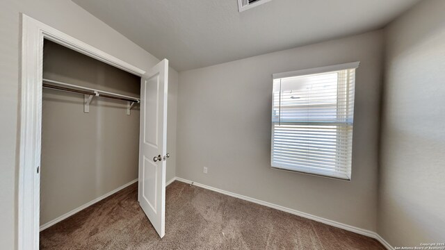 13778 Bradford Park, San Antonio, TX 78253 - unfurnished bedroom with carpet, baseboards, and a closet