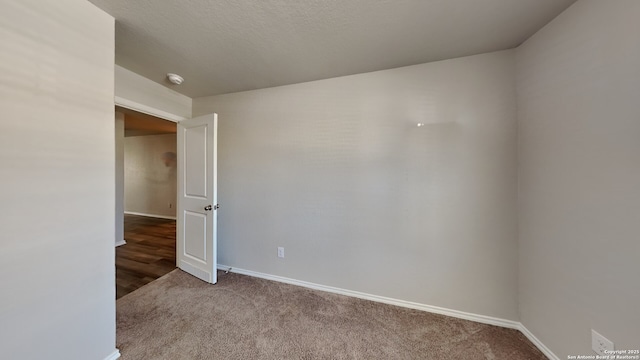13778 Bradford Park, San Antonio, TX 78253 - carpeted empty room with baseboards and a smoke detector
