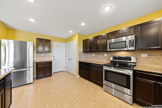 7923 Martinelli, San Antonio, TX 78253 - kitchen featuring stainless steel appliances, dark brown cabinets, backsplash, and recessed lighting