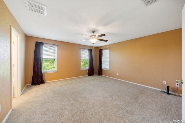 7923 Martinelli, San Antonio, TX 78253 - spare room with a ceiling fan, baseboards, and light colored carpet
