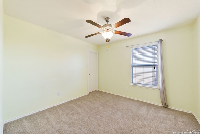 7923 Martinelli, San Antonio, TX 78253 - spare room featuring light colored carpet, baseboards, and ceiling fan