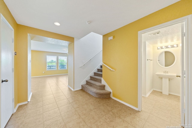 7923 Martinelli, San Antonio, TX 78253 - staircase with tile patterned floors, baseboards, and recessed lighting