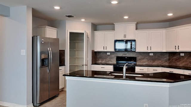 7918 Hanging, San Antonio, TX 78253 - kitchen featuring black appliances, white cabinetry, dark countertops, backsplash, and recessed lighting