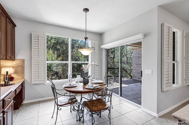 4602 Fort Boggy, San Antonio, TX 78253 - dining room featuring baseboards and light tile patterned floors