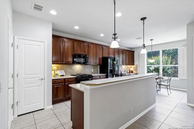 4602 Fort Boggy, San Antonio, TX 78253 - kitchen with black appliances, light countertops, light tile patterned floors, backsplash, and recessed lighting