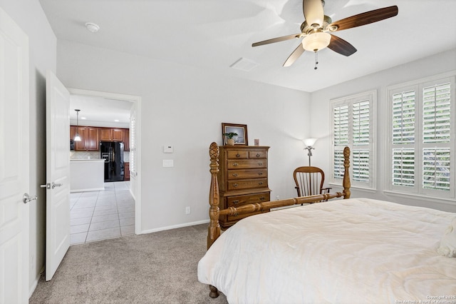 4602 Fort Boggy, San Antonio, TX 78253 - bedroom with black fridge with ice dispenser, light carpet, baseboards, light tile patterned floors, and a ceiling fan