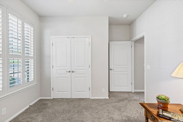 4602 Fort Boggy, San Antonio, TX 78253 - carpeted bedroom featuring multiple windows, baseboards, and a closet