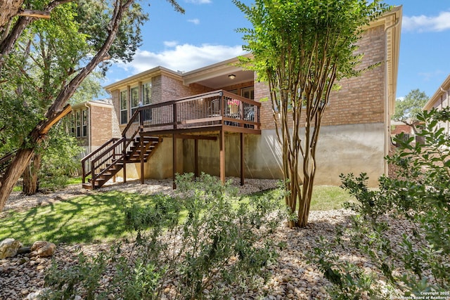 4602 Fort Boggy, San Antonio, TX 78253 - rear view of house with brick siding, stairs, a deck, and a yard