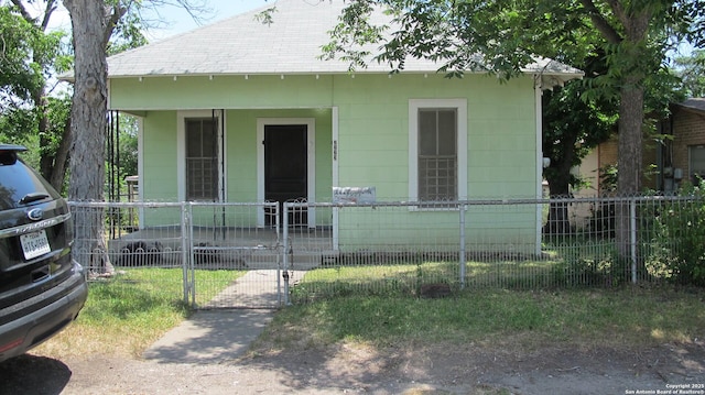 2222 Osburn, San Antonio, TX 78208 - bungalow-style house with a fenced front yard, a porch, and a gate