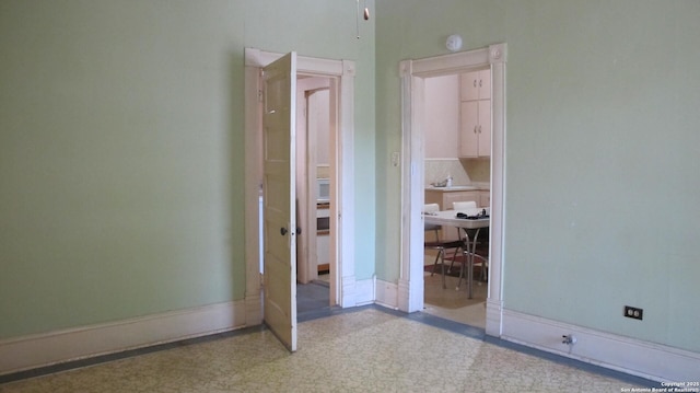2222 Osburn, San Antonio, TX 78208 - spare room with a sink, an office area, and baseboards