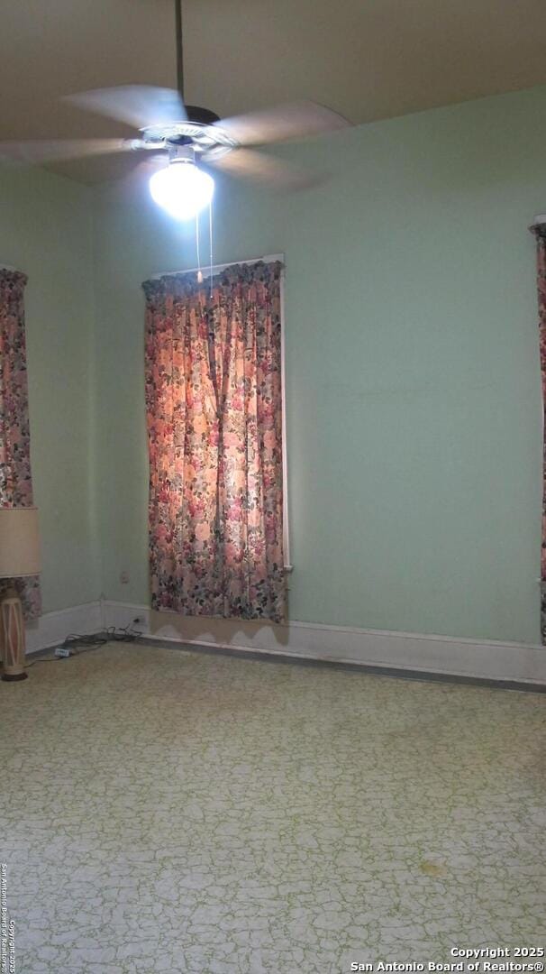 2222 Osburn, San Antonio, TX 78208 - unfurnished room with a ceiling fan and baseboards