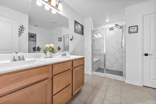 15836 Selene, San Antonio, TX 78245 - bathroom featuring a shower stall, tile patterned floors, and double vanity