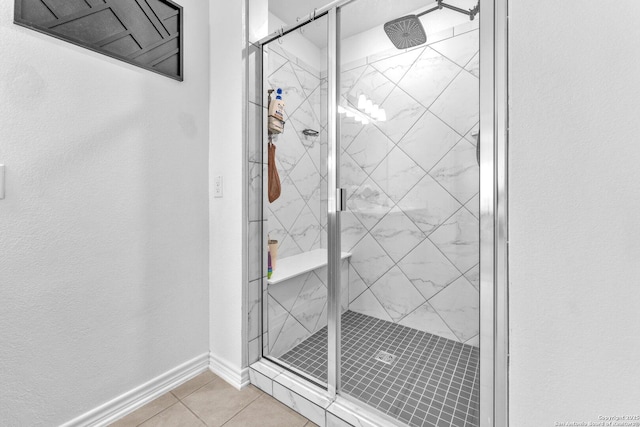 15836 Selene, San Antonio, TX 78245 - bathroom with tile patterned floors, a marble finish shower, and baseboards