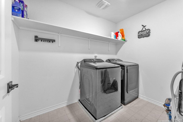 15836 Selene, San Antonio, TX 78245 - washroom with washing machine and clothes dryer and baseboards