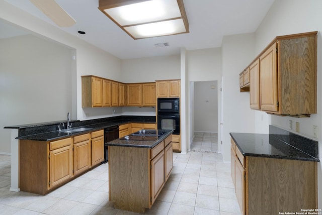 5919 Cedar Path, San Antonio, TX 78249 - kitchen featuring a sink, black appliances, light tile patterned flooring, a peninsula, and dark stone countertops