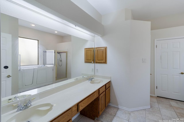 5919 Cedar Path, San Antonio, TX 78249 - bathroom with a stall shower, double vanity, baseboards, and tile patterned flooring
