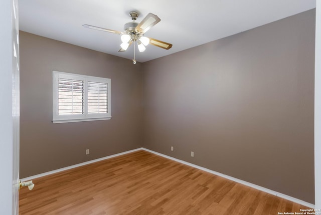 5919 Cedar Path, San Antonio, TX 78249 - spare room with light wood-style floors, a ceiling fan, and baseboards