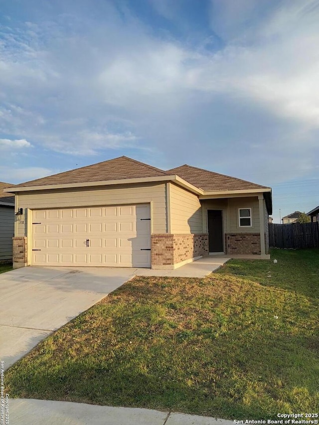530 Pleasanton, San Antonio, TX 78221 - ranch-style house with brick siding, concrete driveway, and an attached garage