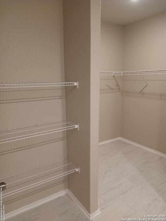 530 Pleasanton, San Antonio, TX 78221 - spacious closet featuring marble finish floors