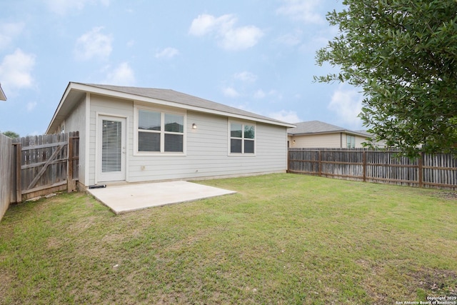rear view of house with a patio area
