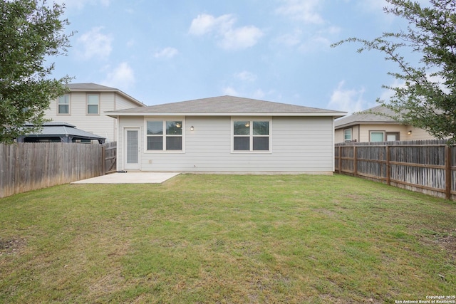 rear view of property with a patio