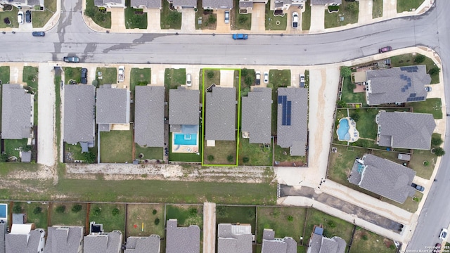 aerial perspective of suburban area featuring property boundaries highlighted