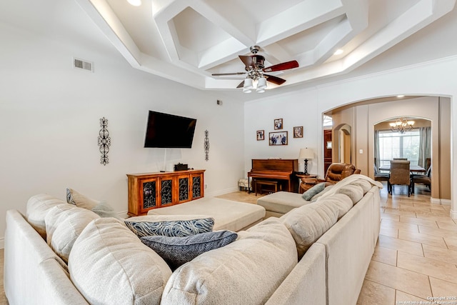 515 County Road 3822, San Antonio, TX 78253 - living room featuring arched walkways, coffered ceiling, a chandelier, a ceiling fan, and light tile patterned floors