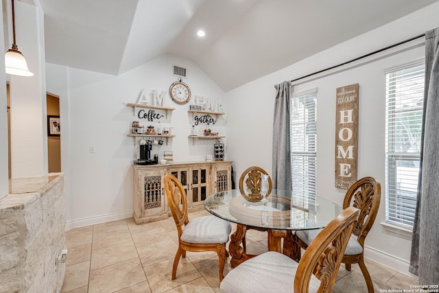 515 County Road 3822, San Antonio, TX 78253 - dining room featuring bar area, lofted ceiling, baseboards, light tile patterned floors, and recessed lighting