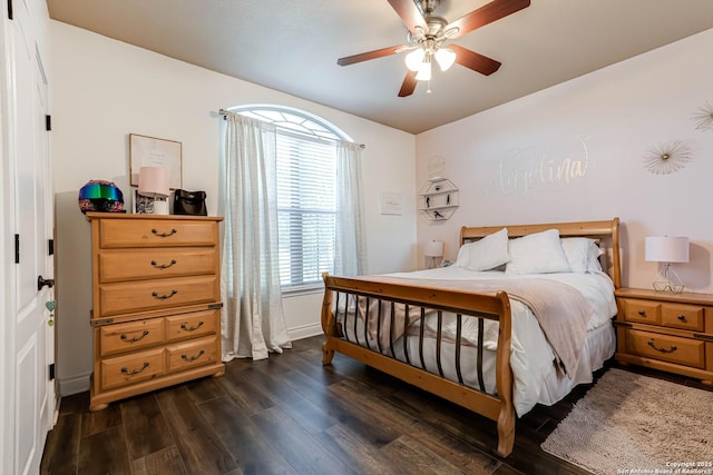 515 County Road 3822, San Antonio, TX 78253 - bedroom featuring dark wood finished floors, baseboards, and a ceiling fan