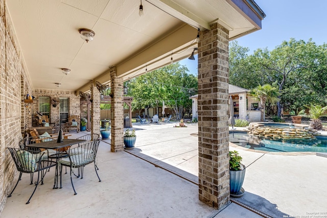 515 County Road 3822, San Antonio, TX 78253 - view of patio / terrace with a pool with connected hot tub