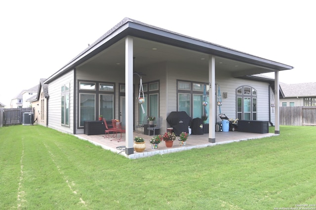 2965 Grove Way, Seguin, TX 78155 - back of house with cooling unit and a patio