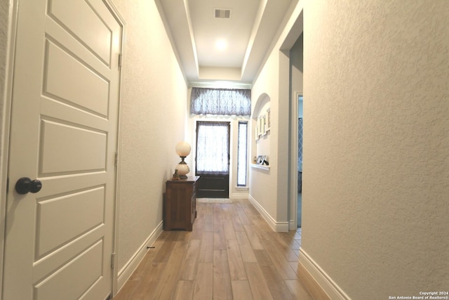 2965 Grove Way, Seguin, TX 78155 - hall with a textured wall, wood finished floors, and baseboards