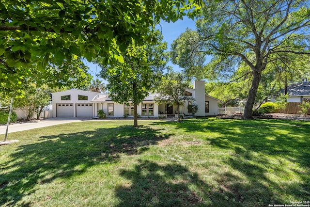 7214 N Vandiver, San Antonio, TX 78209 - mid-century home featuring an attached garage, driveway, and a chimney
