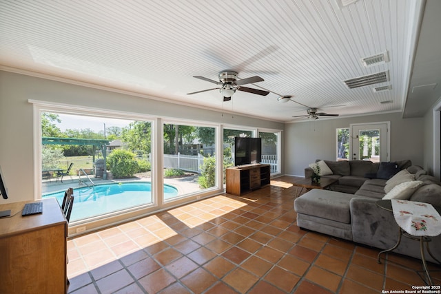 7214 N Vandiver, San Antonio, TX 78209 - living area with ceiling fan and dark tile patterned flooring