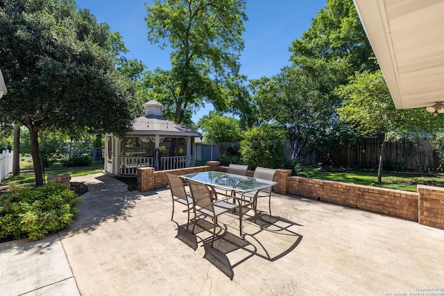 7214 N Vandiver, San Antonio, TX 78209 - view of patio / terrace featuring a gazebo, outdoor dining area, and a fenced backyard