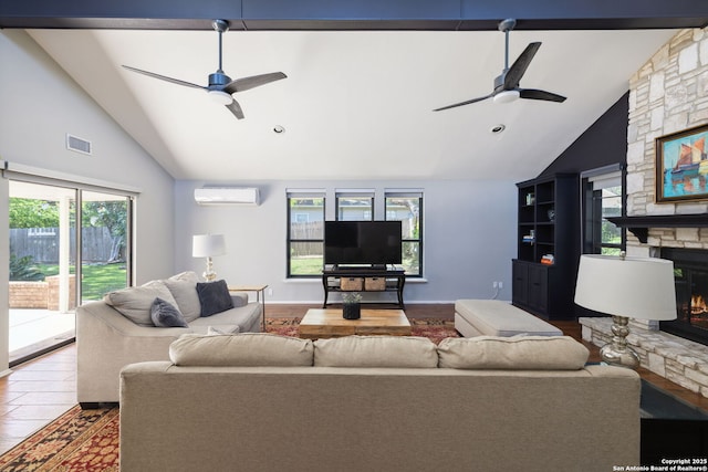 7214 N Vandiver, San Antonio, TX 78209 - living room featuring ceiling fan, a wall mounted AC, a fireplace, wood finished floors, and high vaulted ceiling